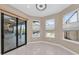 Breakfast nook with sliding door leading to the pool at 8273 Shooting Star Rd, Sarasota, FL 34241