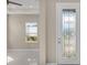 Bright and airy entryway with tile flooring at 8273 Shooting Star Rd, Sarasota, FL 34241