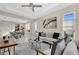 Light and airy living room with a comfortable couch and dining area at 8273 Shooting Star Rd, Sarasota, FL 34241