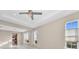 Spacious living room with hardwood floors and lots of natural light at 8273 Shooting Star Rd, Sarasota, FL 34241