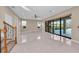 Spacious living room with sliding glass doors to patio at 8273 Shooting Star Rd, Sarasota, FL 34241