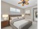 Comfortable main bedroom with neutral decor and ample natural light at 8273 Shooting Star Rd, Sarasota, FL 34241