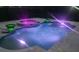 Cool off in this refreshing, illuminated pool with a spa, perfect for nighttime relaxation at 8273 Shooting Star Rd, Sarasota, FL 34241