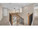 Spacious upstairs hallway with a view of the second floor at 8273 Shooting Star Rd, Sarasota, FL 34241