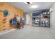 Spacious and well-organized garage with storage solutions for beach equipment and accessories at 915 N Shore Dr, Anna Maria, FL 34216
