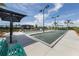 Two bocce ball courts with shade umbrellas at 10031 Crooked Creek Dr # 201, Venice, FL 34293