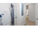 Laundry room with washer, dryer and ironing board at 10031 Crooked Creek Dr # 201, Venice, FL 34293