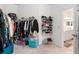 Large walk-in closet with clothing racks and shoe storage at 10031 Crooked Creek Dr # 201, Venice, FL 34293