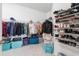Spacious walk-in closet with ample hanging space and shelving at 10031 Crooked Creek Dr # 201, Venice, FL 34293