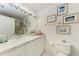 Clean bathroom with a vanity, toilet, and shower/tub combo at 1105 Gondola Park Dr # 1105, Venice, FL 34292