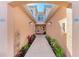 Well-lit entryway with tile flooring and access to unit 1105 and 1106 at 1105 Gondola Park Dr # 1105, Venice, FL 34292