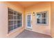 Inviting condo front door entry with sidelights and window at 1105 Gondola Park Dr # 1105, Venice, FL 34292