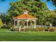 Quaint gazebo with benches in a lush green park setting at 1105 Gondola Park Dr # 1105, Venice, FL 34292