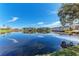 Tranquil lake view of community with lush green spaces at 1105 Gondola Park Dr # 1105, Venice, FL 34292