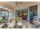 Sunroom with view into living room and access to outdoors at 1105 Gondola Park Dr # 1105, Venice, FL 34292