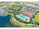 Aerial view of community with pools, tennis courts, and clubhouse at 12785 Fontana Loop, Bradenton, FL 34211