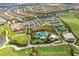 Aerial view of community with pool and golf course at 12785 Fontana Loop, Bradenton, FL 34211