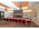 Private dining room with fireplace and wine storage at 12785 Fontana Loop, Bradenton, FL 34211