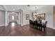 Elegant dining room with hardwood floors and a six-person table at 12785 Fontana Loop, Bradenton, FL 34211