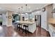 Spacious kitchen with granite island, stainless steel appliances, and hardwood floors at 12785 Fontana Loop, Bradenton, FL 34211