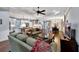 Open concept kitchen with island, stainless steel appliances, and hardwood floors at 12785 Fontana Loop, Bradenton, FL 34211