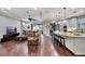 Open living space with hardwood floors and kitchen view at 12785 Fontana Loop, Bradenton, FL 34211