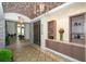 Lobby with decorative tile floor and built-in shelving at 12785 Fontana Loop, Bradenton, FL 34211