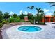 Enjoy the community spa with ample seating and lush landscaping at 12785 Fontana Loop, Bradenton, FL 34211