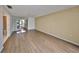 Bedroom with sliding glass doors and wood floors at 131 Pinehurst Dr # 131, Bradenton, FL 34210