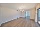 Dining room with hardwood floors and built-in shelving at 131 Pinehurst Dr # 131, Bradenton, FL 34210