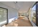 Spacious sunroom with tiled floors and lots of natural light at 131 Pinehurst Dr # 131, Bradenton, FL 34210