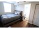 Bedroom with a bed, nightstand and access to bathroom at 1317 E Osborne Ave, Tampa, FL 33603