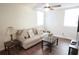 Living room with couch, coffee table, and two end tables at 1317 E Osborne Ave, Tampa, FL 33603