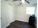 Bright office with wood floor, double door closet and window at 1317 E Osborne Ave, Tampa, FL 33603