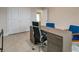 Spacious home office with large desk and built-in cabinets at 1342 Shaker Ln, North Port, FL 34286