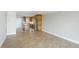 Modern kitchen, featuring wood cabinetry and tile floors at 1608 Stickney Point Rd # 1608-102, Sarasota, FL 34231