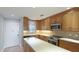 Updated kitchen with stainless steel appliances and light wood cabinets at 1608 Stickney Point Rd # 1608-102, Sarasota, FL 34231