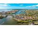 Wide aerial view of waterfront community and surrounding city at 1608 Stickney Point Rd # 1608-102, Sarasota, FL 34231