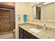 Bathroom boasts granite countertops and a walk-in shower at 1864 Mid Ocean Cir, Sarasota, FL 34239