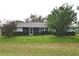 Single story home with a covered patio at 1864 Mid Ocean Cir, Sarasota, FL 34239