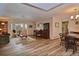 Open living and dining area with hardwood floors at 1864 Mid Ocean Cir, Sarasota, FL 34239