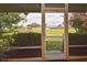 Enjoy golf course views from this screened porch at 1864 Mid Ocean Cir, Sarasota, FL 34239