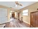 Cozy bedroom with mirrored closet and rocking chair at 2154 Lakewood Dr, Nokomis, FL 34275
