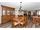 Formal dining room with hardwood floors and a wood dining set at 2154 Lakewood Dr, Nokomis, FL 34275