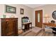 Bright entryway with hardwood floors and antique furniture at 2154 Lakewood Dr, Nokomis, FL 34275