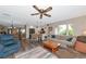 Comfortable living room with hardwood floors and a view to the kitchen at 2154 Lakewood Dr, Nokomis, FL 34275