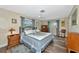 Spacious main bedroom with a king-size bed and ample closet space at 2154 Lakewood Dr, Nokomis, FL 34275