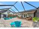 Spacious pool and patio area with screened enclosure at 2154 Lakewood Dr, Nokomis, FL 34275