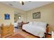 Spacious bedroom with daybed and mirrored closet doors at 2218 Shadow Oaks Rd, Sarasota, FL 34240