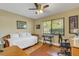 Versatile bedroom with daybed, workspace, and ample natural light at 2218 Shadow Oaks Rd, Sarasota, FL 34240